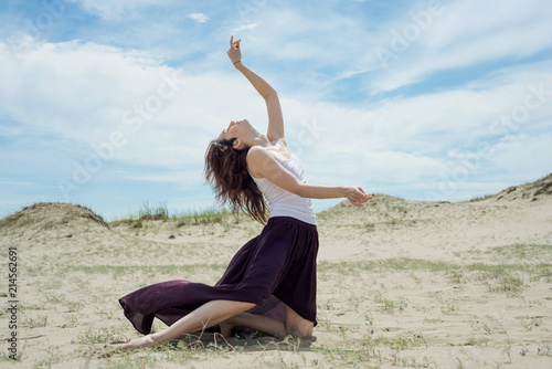 Young woman dancing in nature