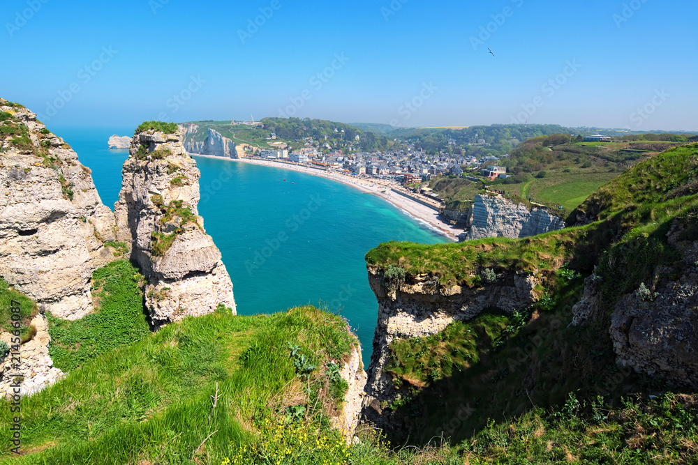 Beautiful landscape on the cliff, city of Etretat and the English Channel in sunny spring day. Etretat, Seine-Maritime department, Normandy, France