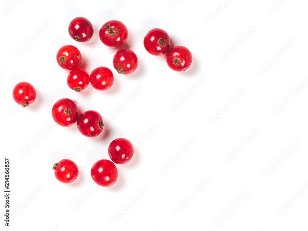 Creative layout of red currant berries. Food and diet concept. Top view of ripe red currant berries with copy space. Isolated on white with clipping path. Creative layout of red currant berries. Food and diet concept. Top view of ripe red currant berries with copy space. Isolated on white with clipping path.