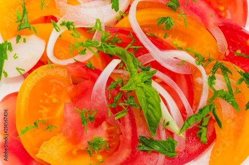 Background of salad of red and yellow tomatoes