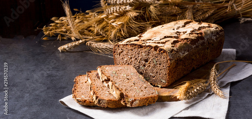delicious and healthy home-made wholegrain bread with honey photo