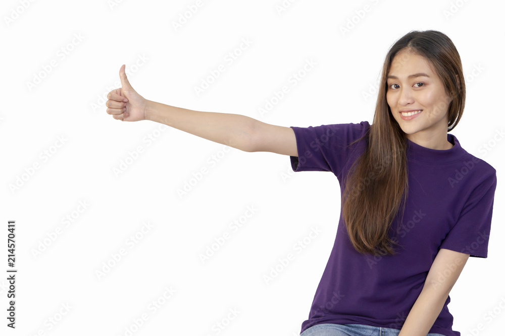 Beautiful young attractive Asian woman showing Thumb up gesture and smiling. Beautiful young attractive Asian woman showing Thumb up gesture and smiling.