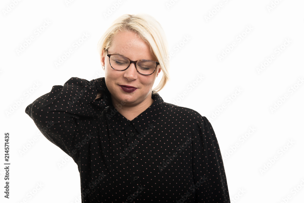 Blonde female teacher wearing glasses showing neck pain gesture