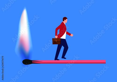 Businessman walking above burning match