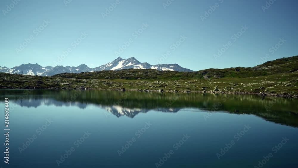 Cinemagraph. Aerial view of Totensee lake on the top of Grimselpass. Switzerland Cinemagraph. Aerial view of Totensee lake on the top of Grimselpass. Switzerland