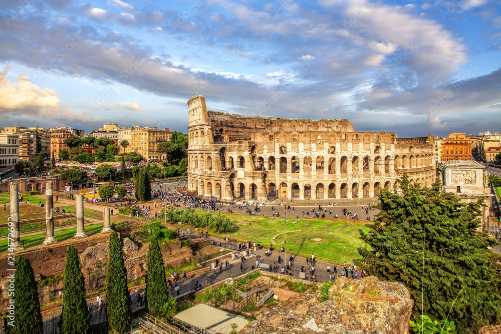 Aerial scenic view of Colosseum in Rome, Italy. Colosseum is one of the main attractions of Rome. Rome architecture and landmark.