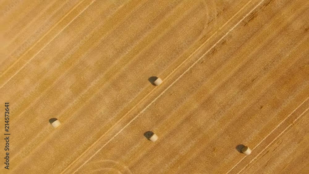 Aerial view of straw bales in a field, UHD, 4K (3840x2160) Aerial view of straw bales in a field, UHD, 4K (3840x2160)