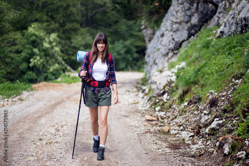 Woman with backpack going on a camping