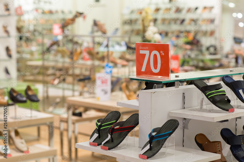 Obraz premium Shoe Sale concept. Shoes discount special price- Shopping, seasonal sale in shops, store