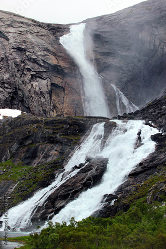 Sotefossen falls, the highest in cascade of four waterfalls in Husedalen valley, Kinsarvik, Norway