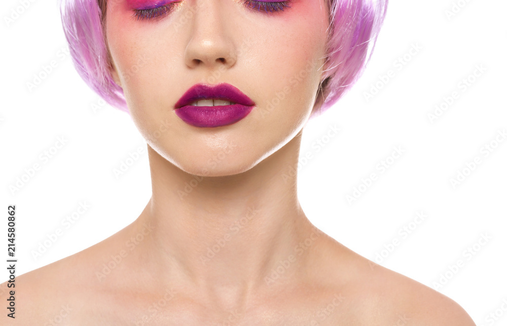 Young woman with unusual hair and professional makeup on white background, closeup Young woman with unusual hair and professional makeup on white background, closeup