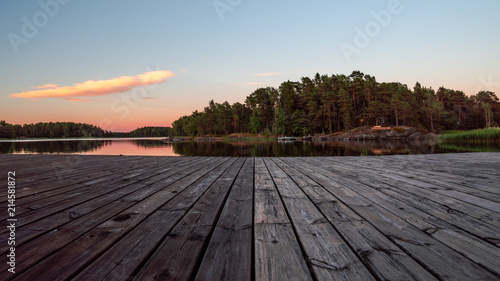 Midsummer sunset from a pier, in Finland.