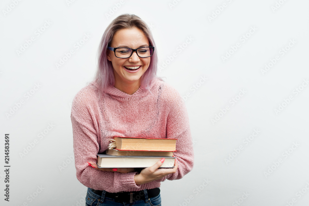 Student. Laughing young woman with the books. Student. Laughing young woman with the books.
