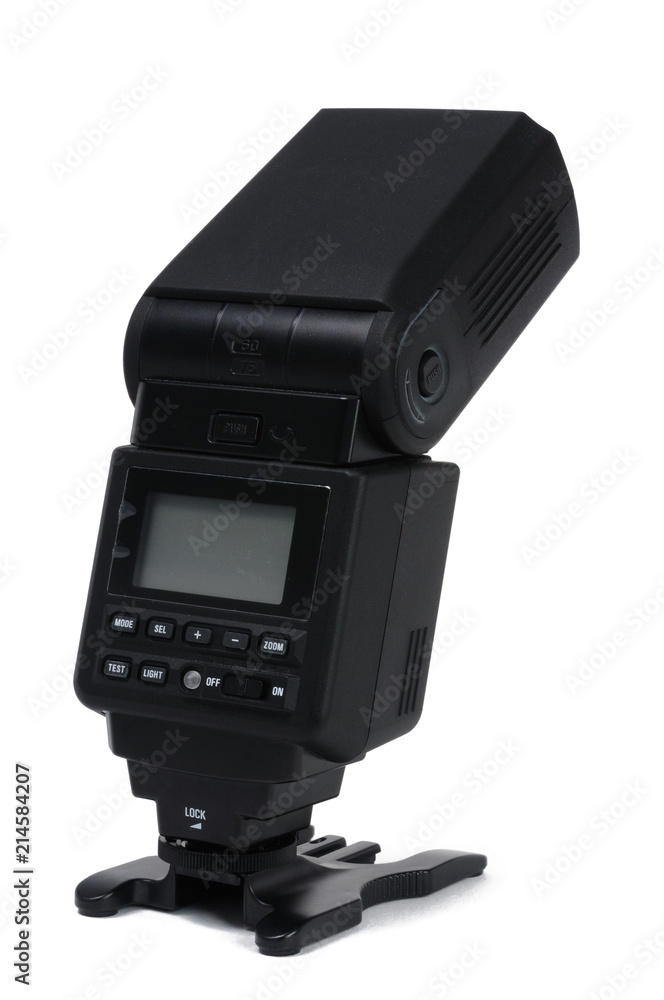 A camera flash on a white background. Back view. A camera flash on a white background. Back view.