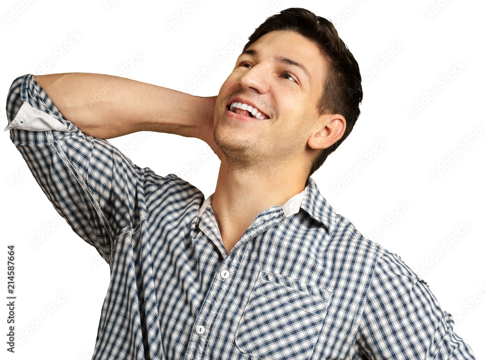Happy young handsome man winner standing against white background Happy young handsome man winner standing against white background