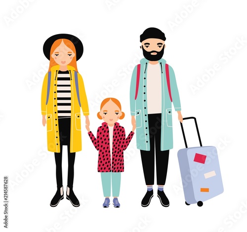 Young traveling family of mother, father and daughter. Mom, dad and child gir...