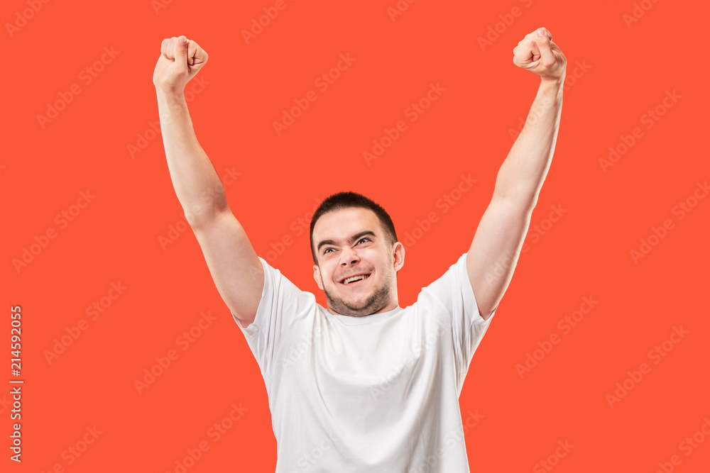 Winning success man happy ecstatic celebrating being a winner. Dynamic energetic image of male model Winning success man happy ecstatic celebrating being a winner. Dynamic energetic image of male model