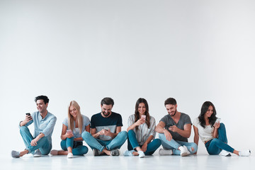 Group of young people on white background