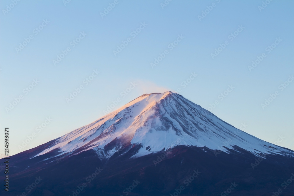 Closeup Fuji mountain (Fujisan) beautiful snowcapped volcano and famous natural landmark of Japan view from Kawaguchiko lake in Yamanashi Prefecture Japan