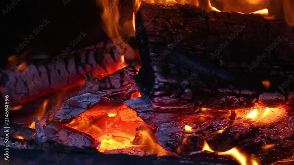 Closeup view of burning firewood with bright fire inside of fireplace. Slow motion hd video footage. Closeup view of burning firewood with bright fire inside of fireplace. Slow motion hd video footage.