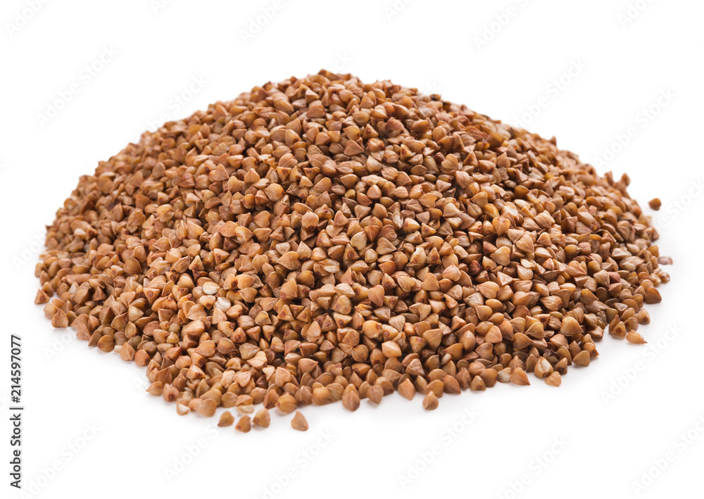 Pile of dry buckwheat isolated on white Pile of dry buckwheat isolated on white