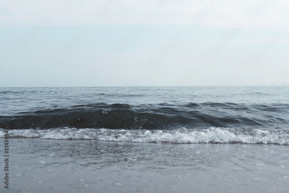 A beautiful sea with a wave off the coast. Photo of an amazing nature A beautiful sea with a wave off the coast. Photo of an amazing nature