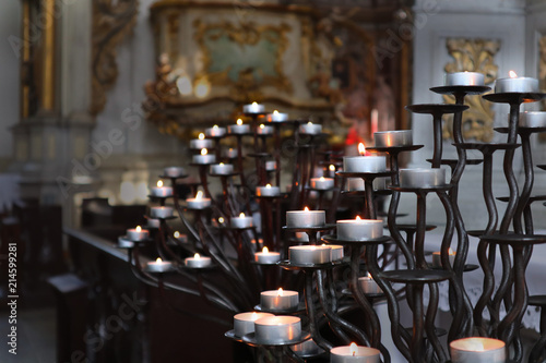 Fototapeta Naklejka Na Ścianę i Meble -  Candles in catholic church