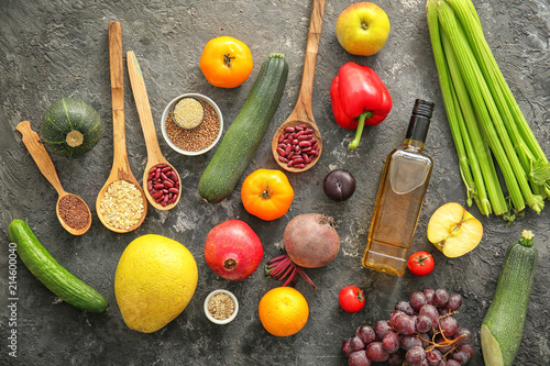 Various healthy products on grey background