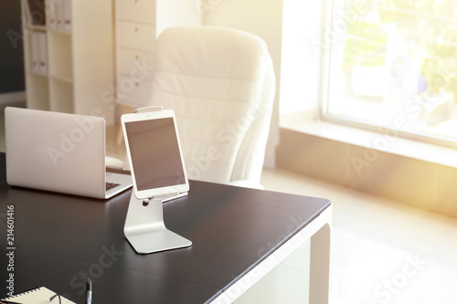 Tablet PC with holder on ta...