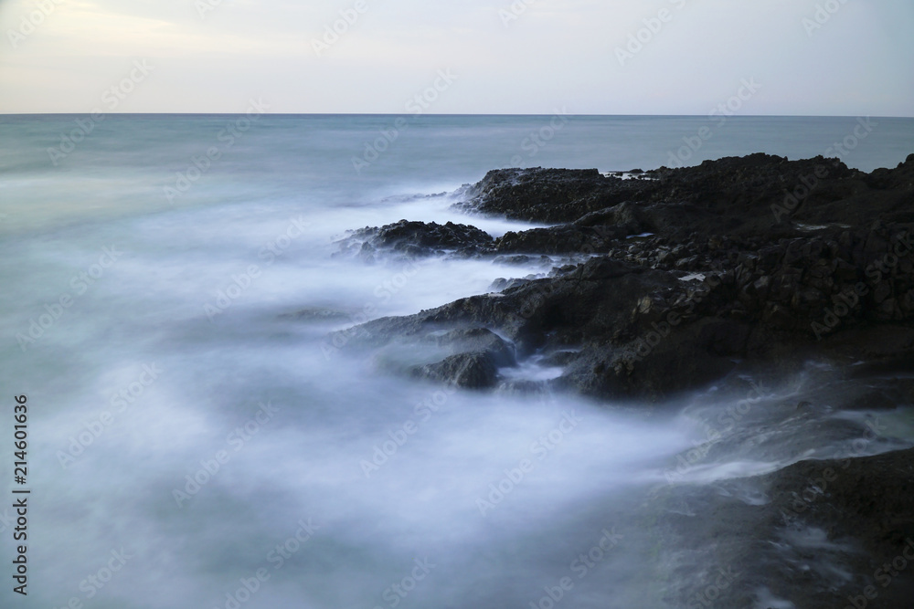 Long exposured rocks at the seacoast