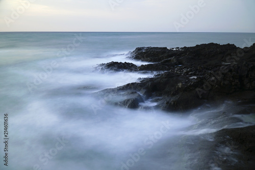 Fototapeta Naklejka Na Ścianę i Meble -  Long exposured rocks at the seacoast