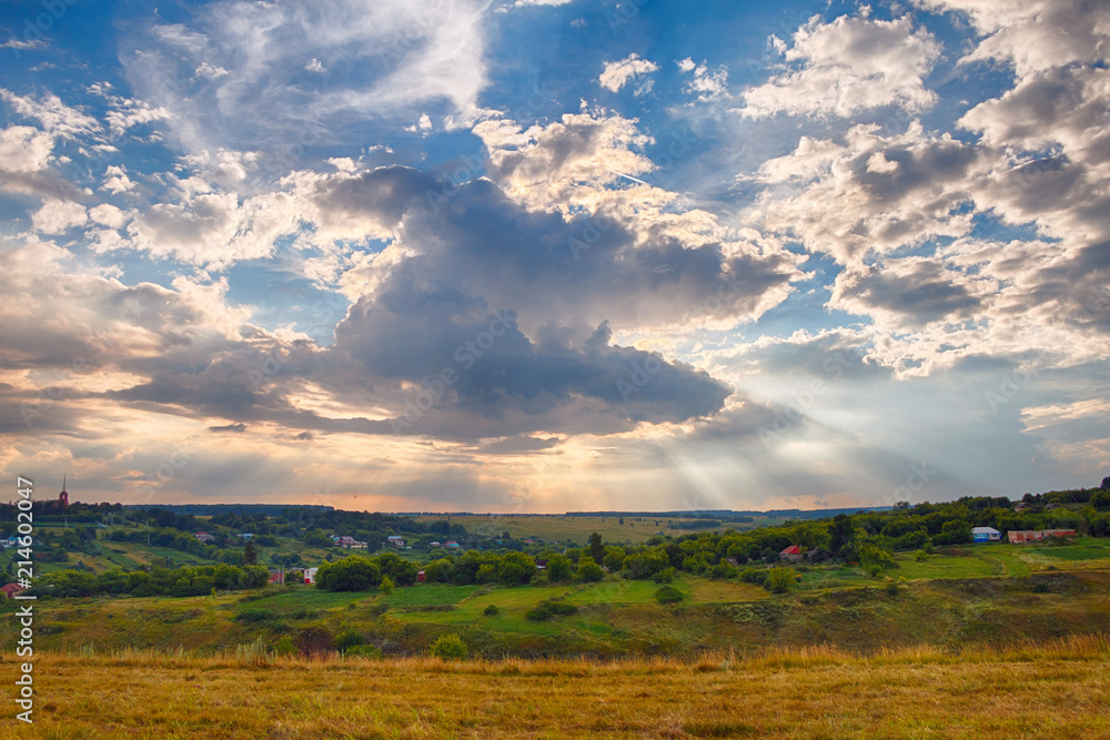 Panorama of a beautiful countryside summer landscape at sunset Panorama of a beautiful countryside summer landscape at sunset