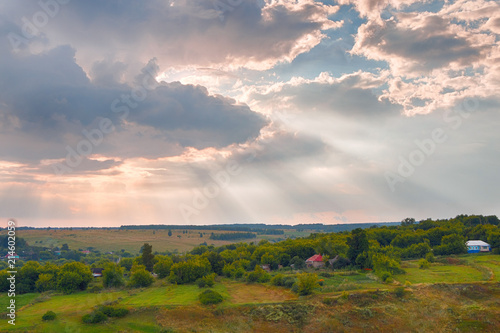 Panorama of a beautiful countryside summer landscape at sunset