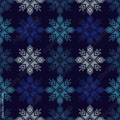 Cross stitch Norwegian snowflakes. Seamless vector background. Folk motives. Winter pattern. Textile rapport.