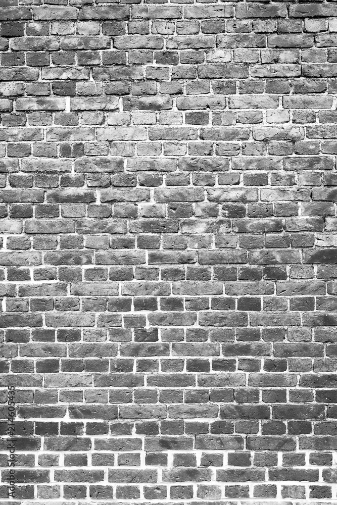 Fototapeta premium Old worn brick wall exterior pattern texture background