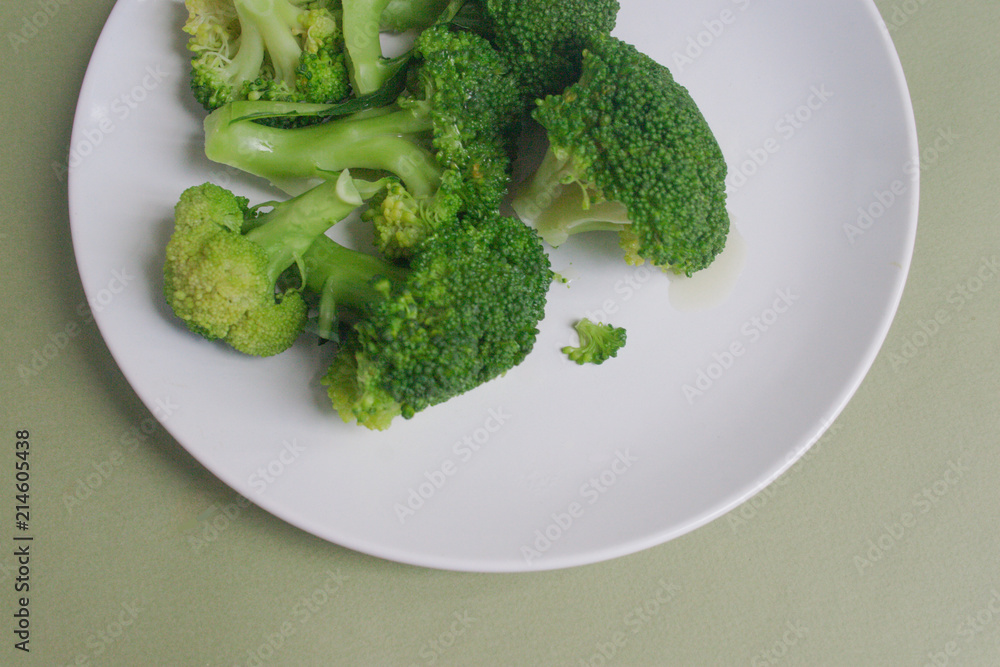 Broccoli on a plate. View from above. Candid. Broccoli on a plate. View from above. Candid.