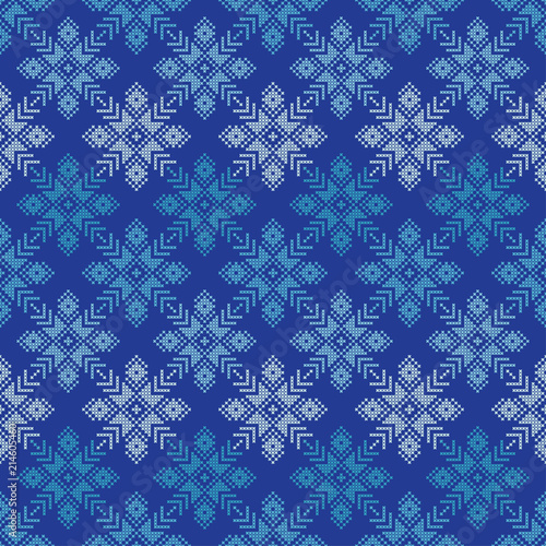 Cross stitch Norwegian snowflakes. Seamless vector background. Folk motives. Winter pattern. Textile rapport.