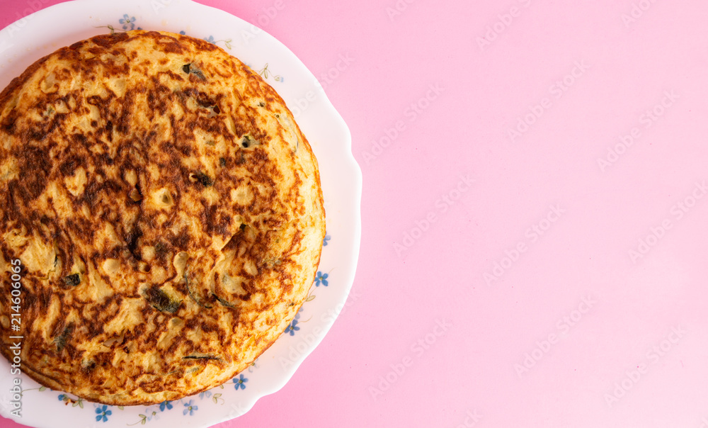 potato omelet on colorful background potato omelet on colorful background