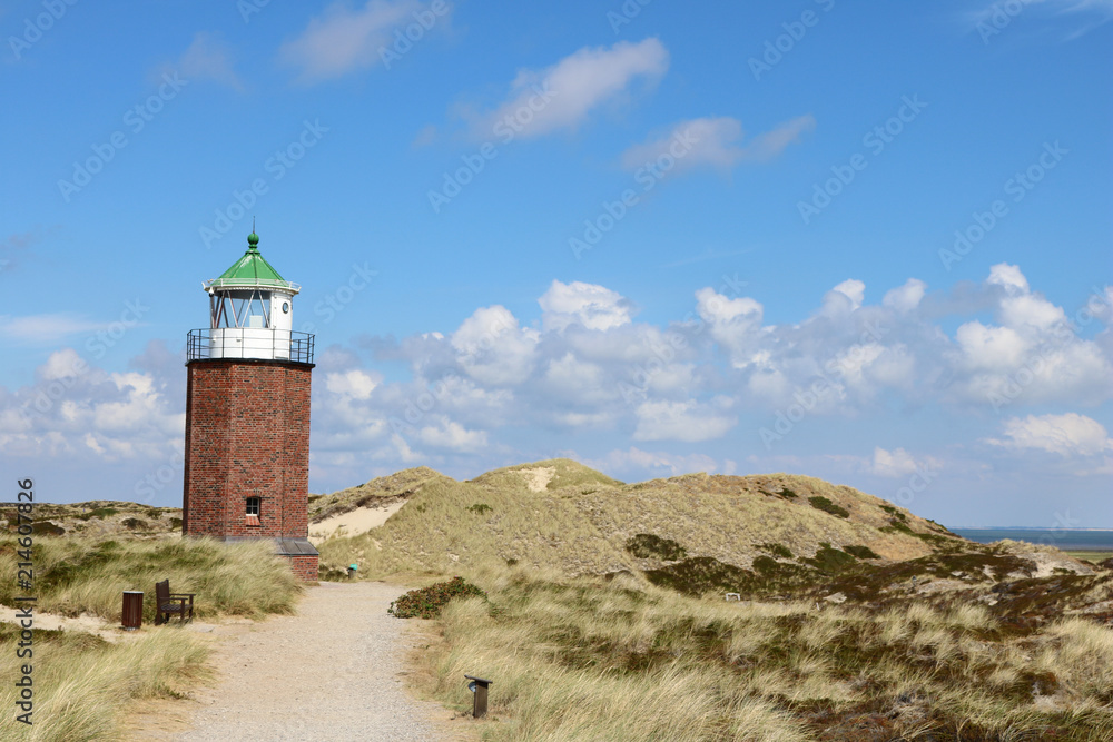Landscape of Rotes Kliff lighthouse, on the island of Sylt, Germany, located on a cliffside north of the village of Kampen.