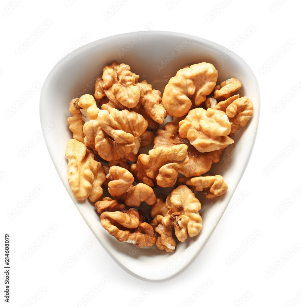 Bowl with tasty walnuts on white background Bowl with tasty walnuts on white background