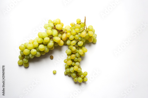 Two bunches of ripe sultana white grape isolated on white background