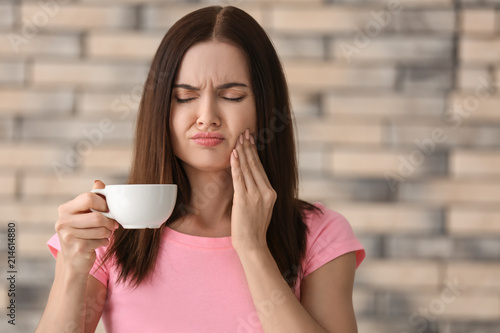Young woman with sensitive ...