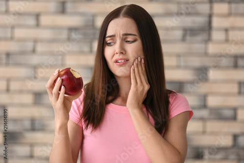 Young woman with sensitive ...