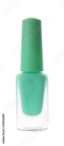 Glass bottle of nail polish on white background