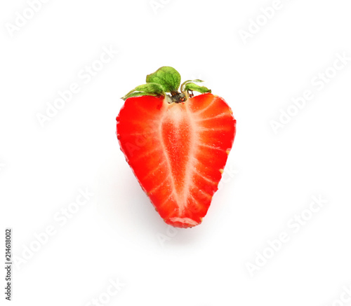 Half of ripe red strawberry on white background