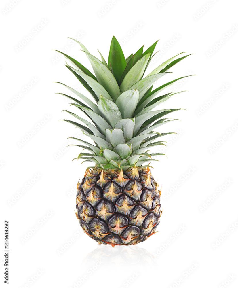 Fresh pineapple with split leaves on a white background. Fresh pineapple with split leaves on a white background.