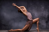 Young afro girl dancing, sensual pose.