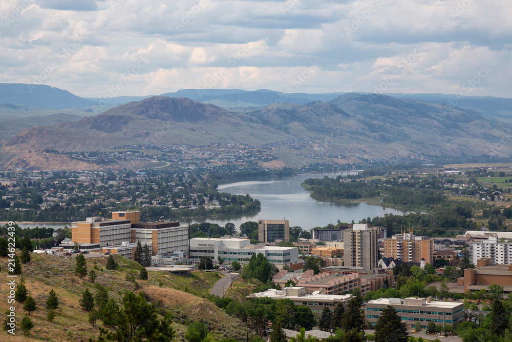 Aerial view of Kamloops City during a cloudy summer day. Located in Interior BC, Canada.