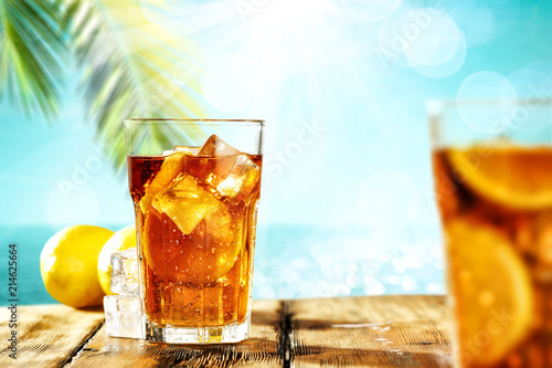 Summer drink of ice tea and palm 