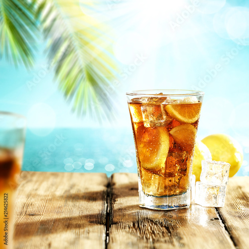 Summer drink of ice tea and palm 